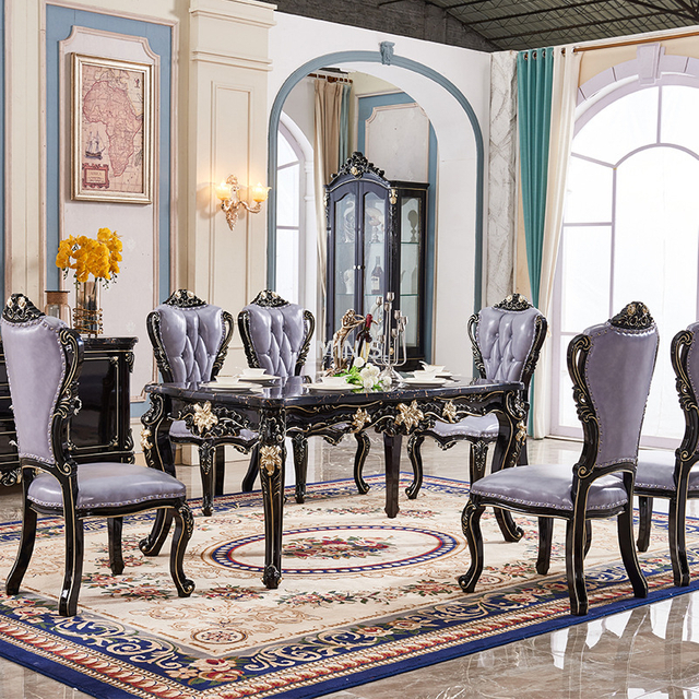 Hermosa mesa de comedor rectangular de m&aacute;rmol y madera dorada con silla