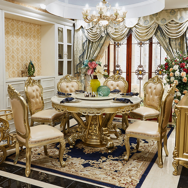 Sillas de comedor de cuero azul Mesa de comedor redonda de m&aacute;rmol y madera